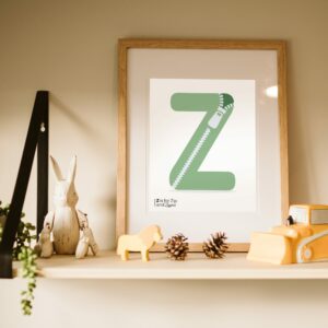 A z is for zip alphabet art illustrated print framed as a nursery decoration